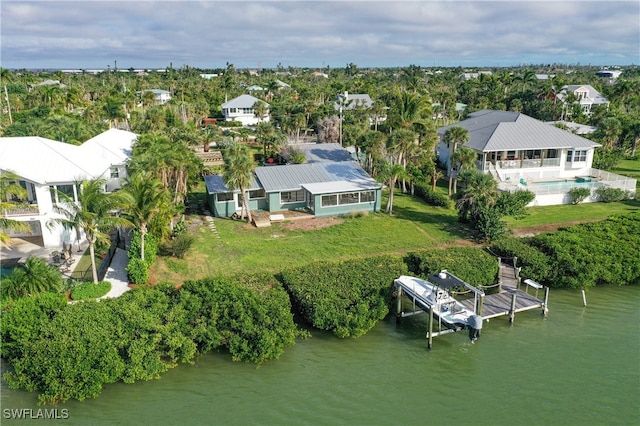 bird's eye view with a water view