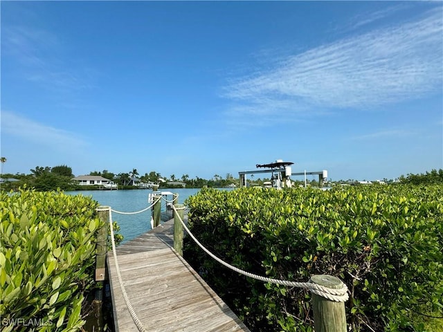 view of dock with a water view