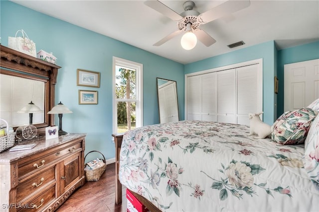 bedroom featuring ceiling fan and hardwood / wood-style floors