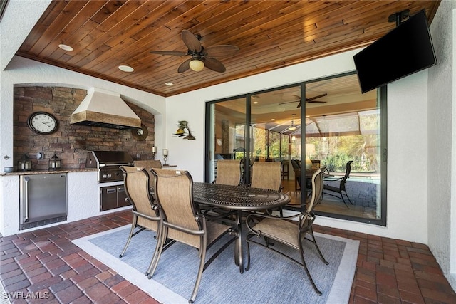 view of patio featuring ceiling fan and area for grilling