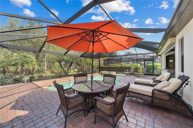 view of patio / terrace with an in ground hot tub and glass enclosure