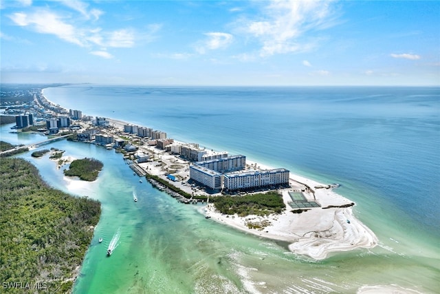 bird's eye view featuring a view of the beach and a water view