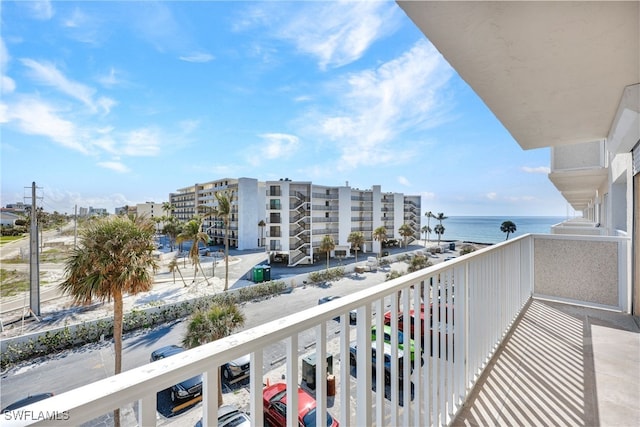 balcony featuring a water view