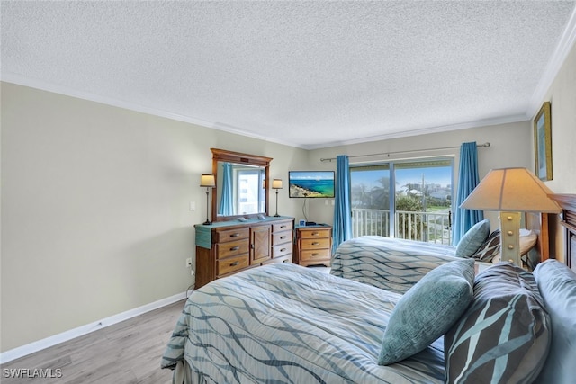 bedroom with ornamental molding, access to exterior, light hardwood / wood-style floors, and multiple windows