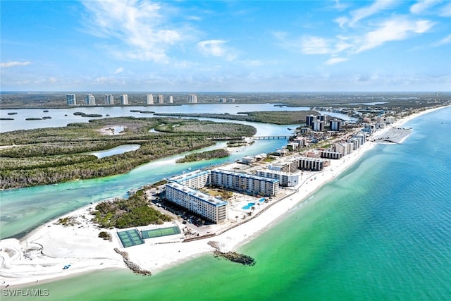 aerial view featuring a water view and a view of the beach