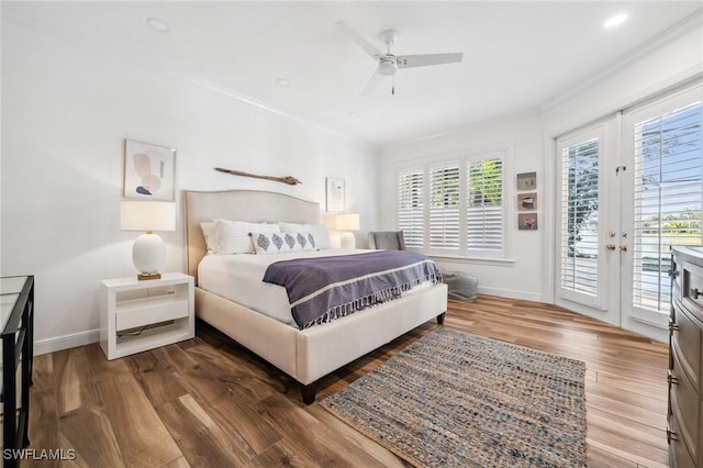 bedroom with hardwood / wood-style flooring, ceiling fan, access to exterior, and crown molding