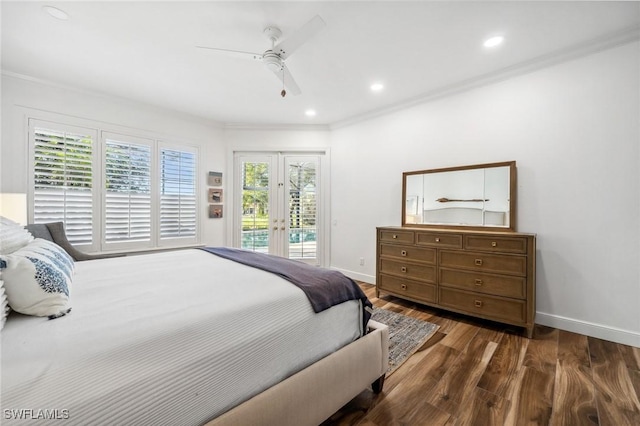 bedroom featuring dark wood-type flooring, access to exterior, multiple windows, and french doors