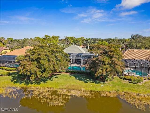 birds eye view of property featuring a water view