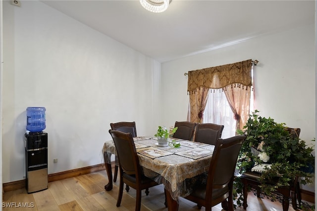 dining space featuring light hardwood / wood-style floors