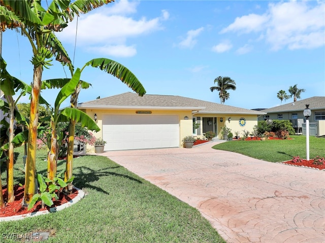 ranch-style house with a garage and a front lawn