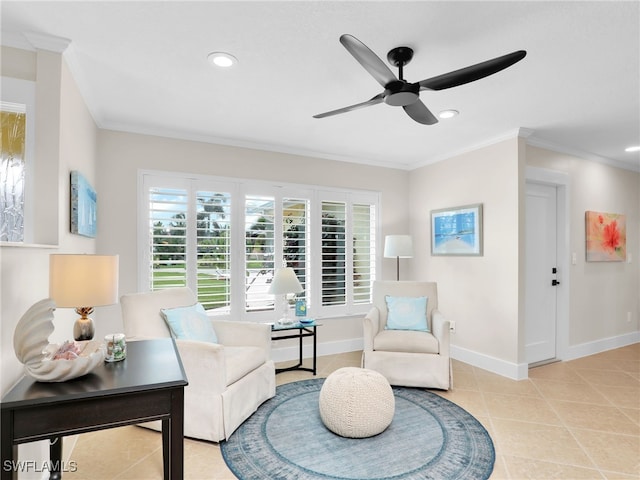 living area with ornamental molding, light tile patterned flooring, and ceiling fan