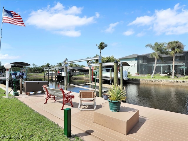 dock area with a water view and a lanai