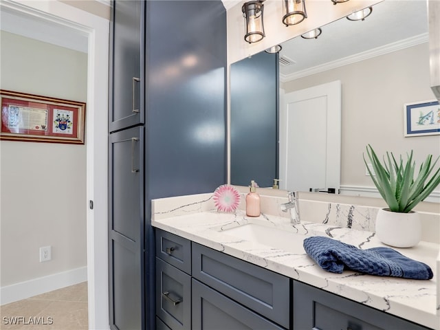 bathroom with vanity, tile patterned flooring, and ornamental molding