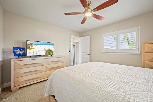 carpeted bedroom featuring ceiling fan