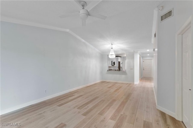 unfurnished living room featuring crown molding, ceiling fan, and light wood-type flooring