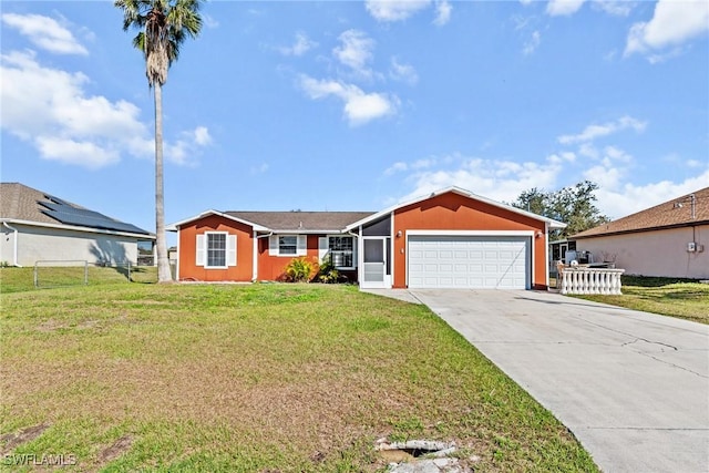 single story home featuring a garage and a front lawn