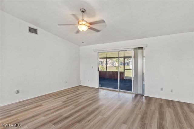 spare room with ceiling fan and light hardwood / wood-style flooring