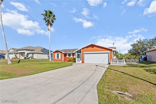 single story home with a garage and a front yard