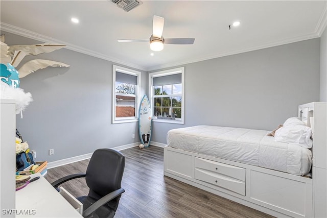 bedroom featuring ornamental molding, ceiling fan, and dark hardwood / wood-style flooring