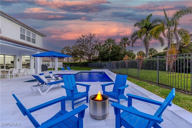 1801 Senegal Date Dr, Naples, FL 34119 - view of pool featuring a fire pit and a patio area
