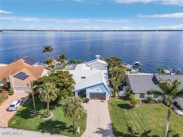 drone / aerial view with a water view