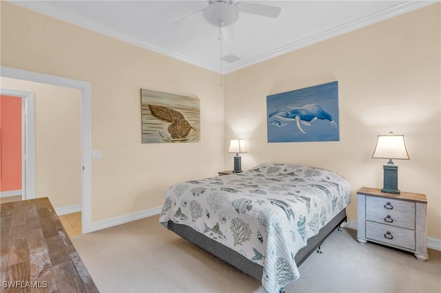 bedroom featuring crown molding, light colored carpet, and ceiling fan