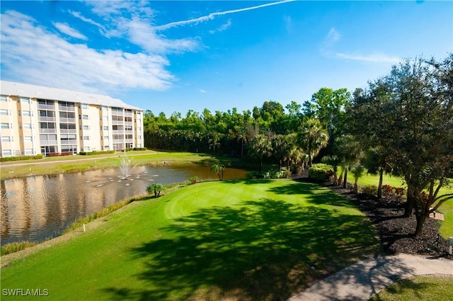 view of community with a water view