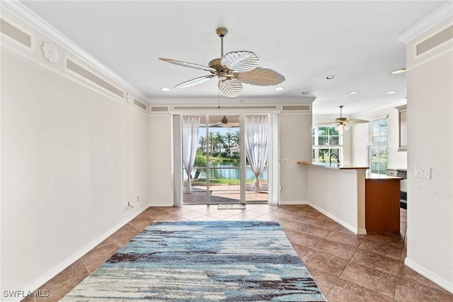 interior space featuring crown molding and ceiling fan