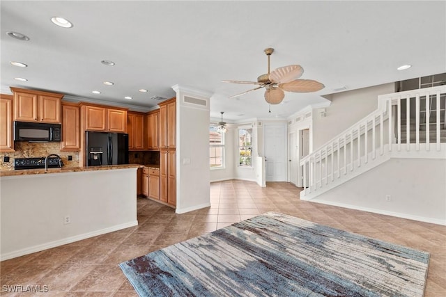 kitchen with tasteful backsplash, light tile patterned floors, ornamental molding, ceiling fan, and black appliances