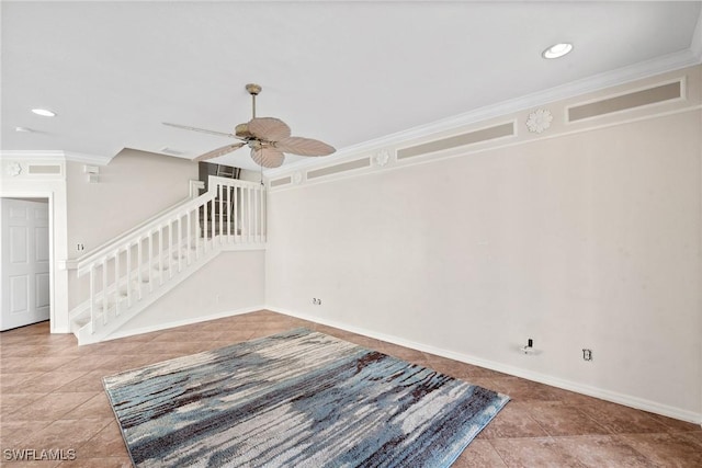 tiled empty room featuring crown molding and ceiling fan