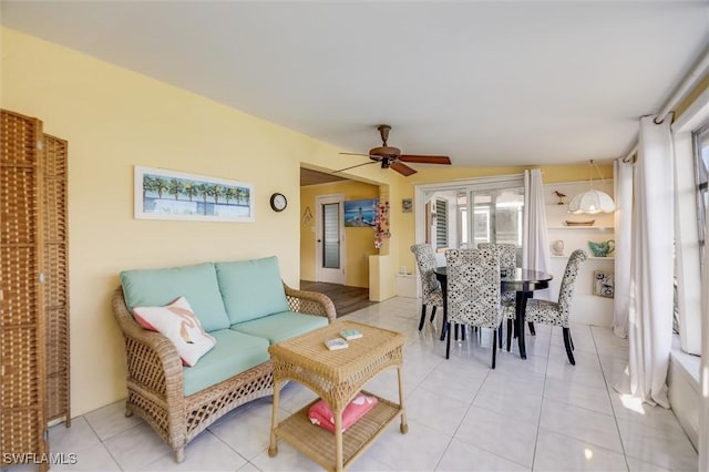 interior space featuring ceiling fan