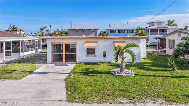 view of front of property with a front lawn