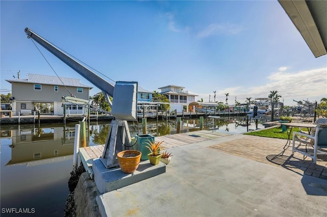 dock area with a water view