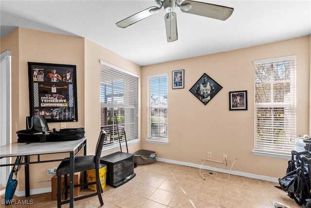 office area featuring ceiling fan and light tile patterned flooring