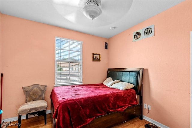 bedroom featuring ceiling fan and light hardwood / wood-style floors