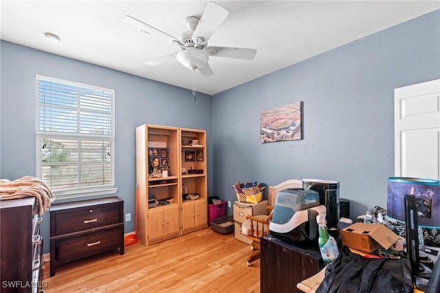 office area featuring ceiling fan and light hardwood / wood-style floors