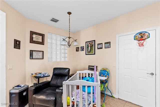 tiled bedroom featuring a crib