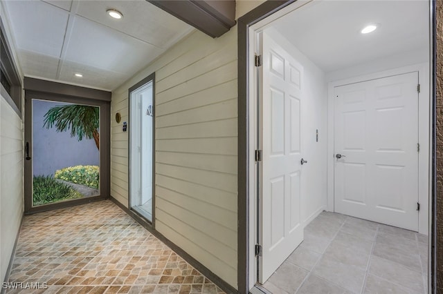 hall with wooden walls