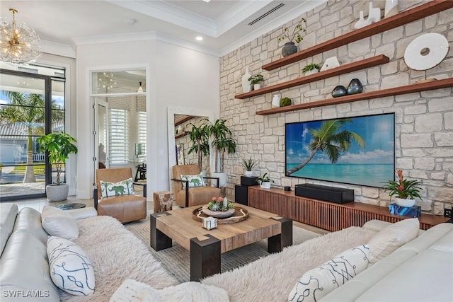 living room featuring crown molding