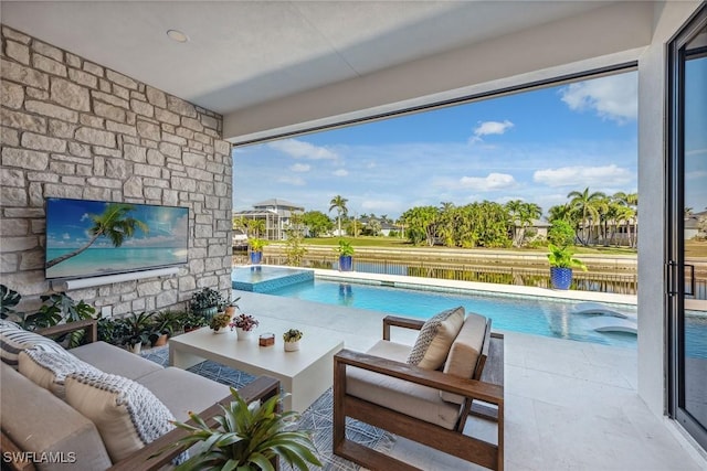 view of pool with an in ground hot tub, an outdoor living space, and a patio