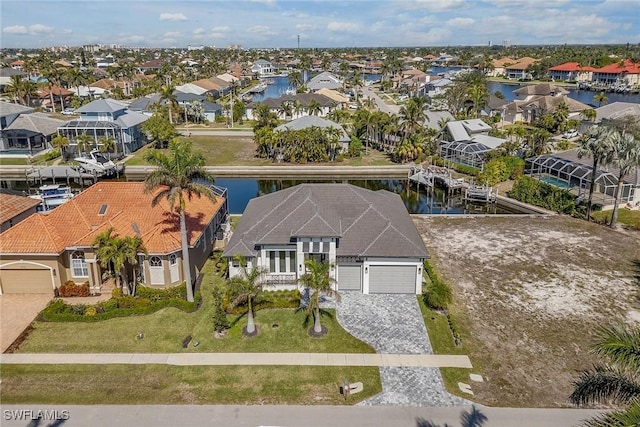 bird's eye view with a water view