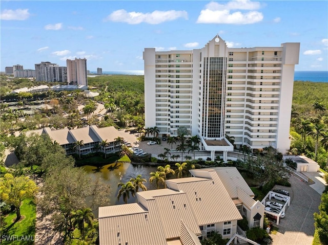 birds eye view of property featuring a water view