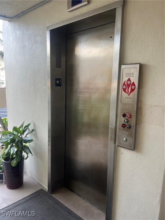 property entrance featuring elevator