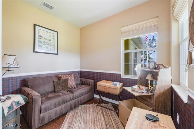 living area featuring hardwood / wood-style floors