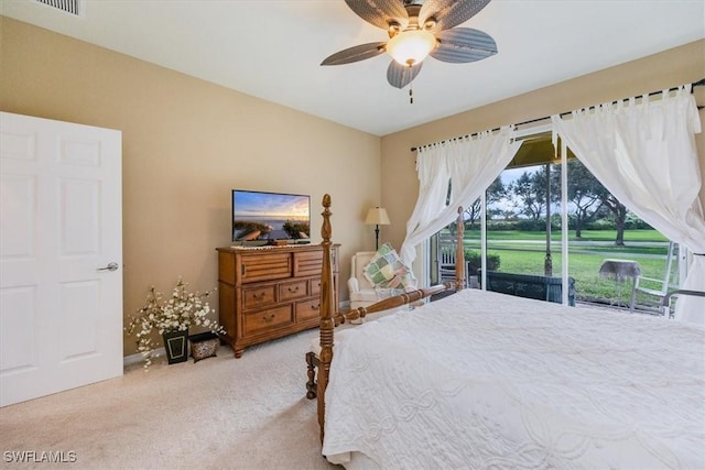 bedroom featuring ceiling fan and light colored carpet