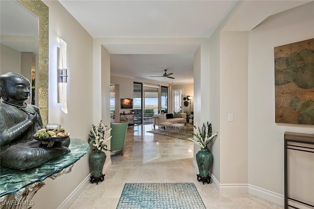 hallway featuring light tile patterned floors