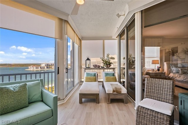 sunroom with a water view