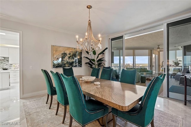 dining area with ceiling fan with notable chandelier, ornamental molding, and expansive windows