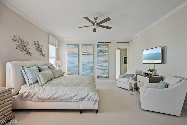 bedroom featuring crown molding, carpet flooring, and ceiling fan