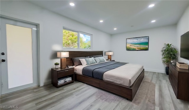 bedroom with light wood-type flooring